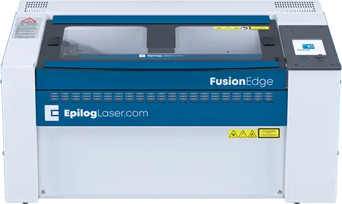 Une machine de découpe laser Epilog Fusion Edge bleue et blanche avec un couvercle transparent, un panneau de commande étiqueté et la marque Epilog Fusion Edge avec des étiquettes d'avertissement de sécurité sur le devant.