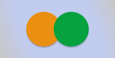 Deux cercles de couleur unie, l'un orange et l'autre vert, se chevauchent légèrement au centre sur un fond gris clair, représentant un dessin précis souvent produit par une imprimante/découpeuse jet d'encre.