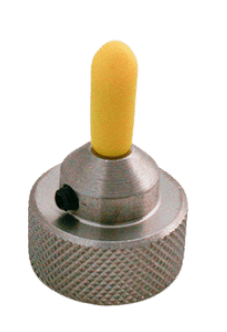 Un petit appareil métallique avec une base texturée, ressemblant à des motifs de gravure complexes, comportant un bouchon ou un bouton semblable à du caoutchouc jaune sur le dessus.