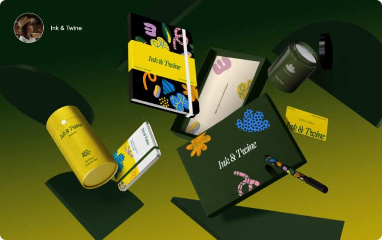 Une collection de produits de papeterie « Ink & Twine » sur fond dégradé vert et jaune présente un objet dart impressionnant. Les articles comprennent des cahiers, un stylo et un emballage, avec des motifs floraux et abstraits colorés.